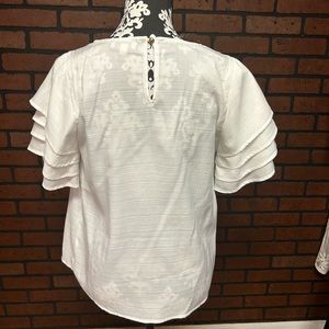 Photo unedited. Like new/excellent condition. Sheer